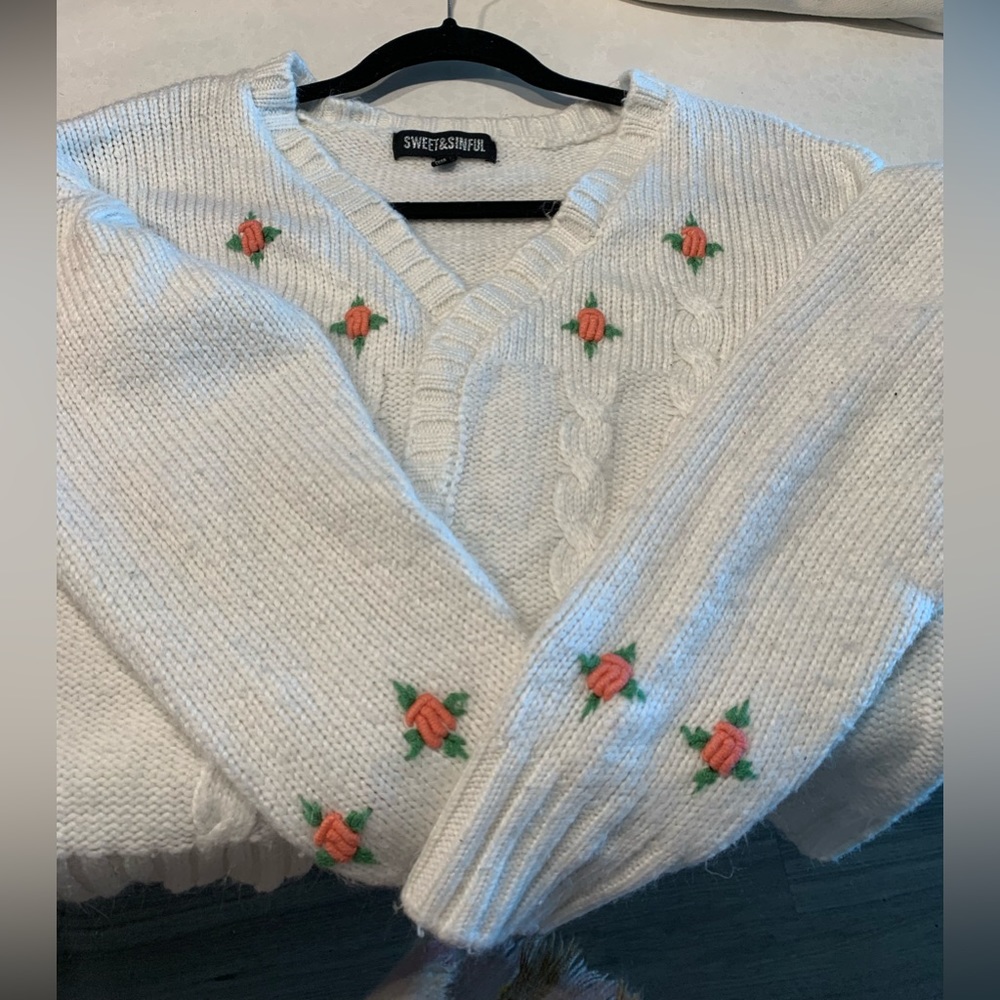 Cream cardigan with floral detailing